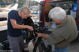 Film crew checking the camera